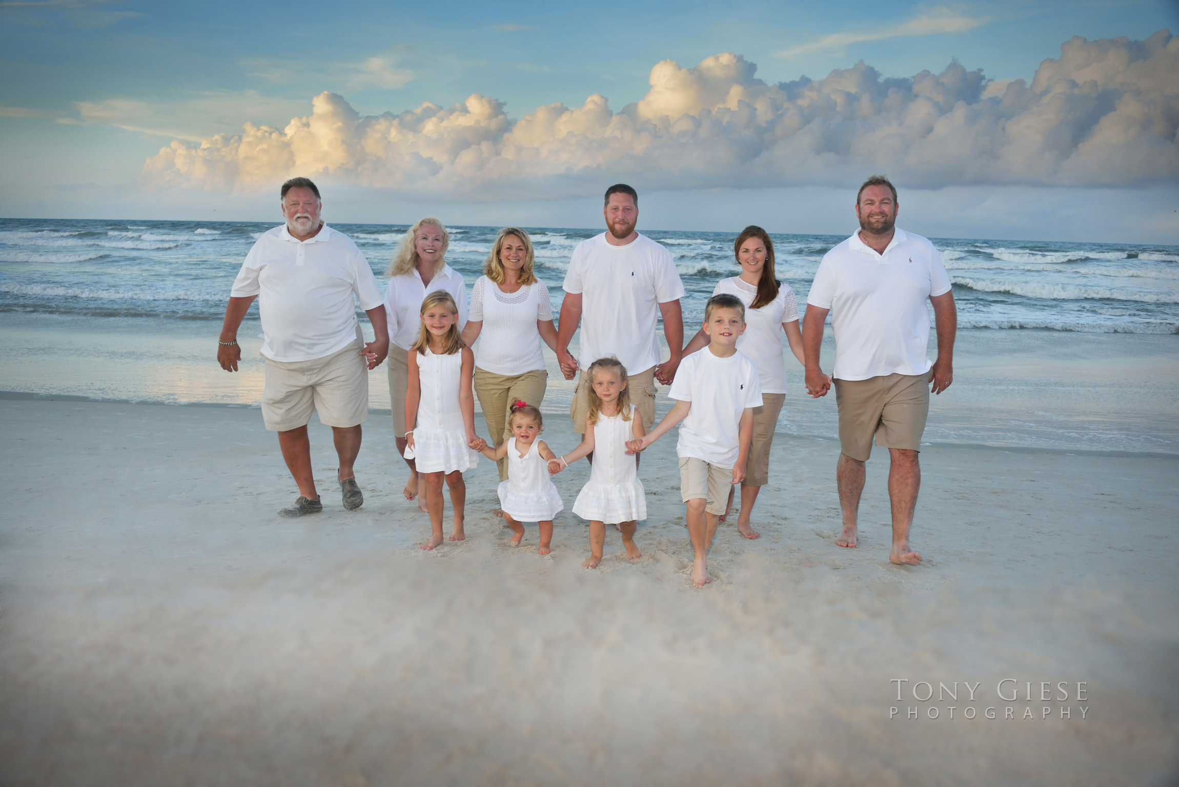 Mid summer is the time of year for fun family beach portraits. Photography by Tony Giese Photography.