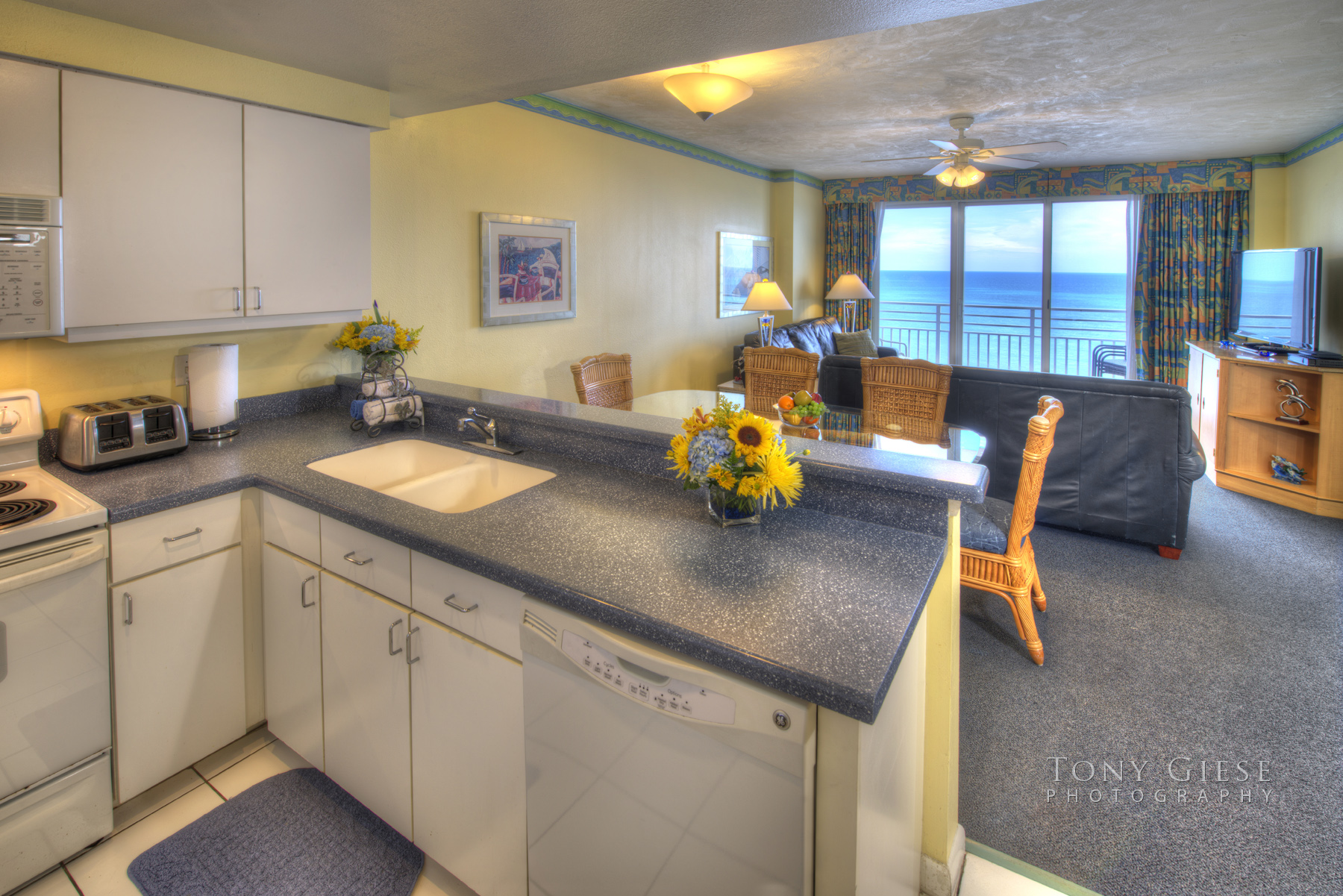 Wyndham Ocean Walk Resort newly remodeled kitchen area with all the latest appliances and a ocean view of Daytona Beach, Florida. Photography by Tony Giese