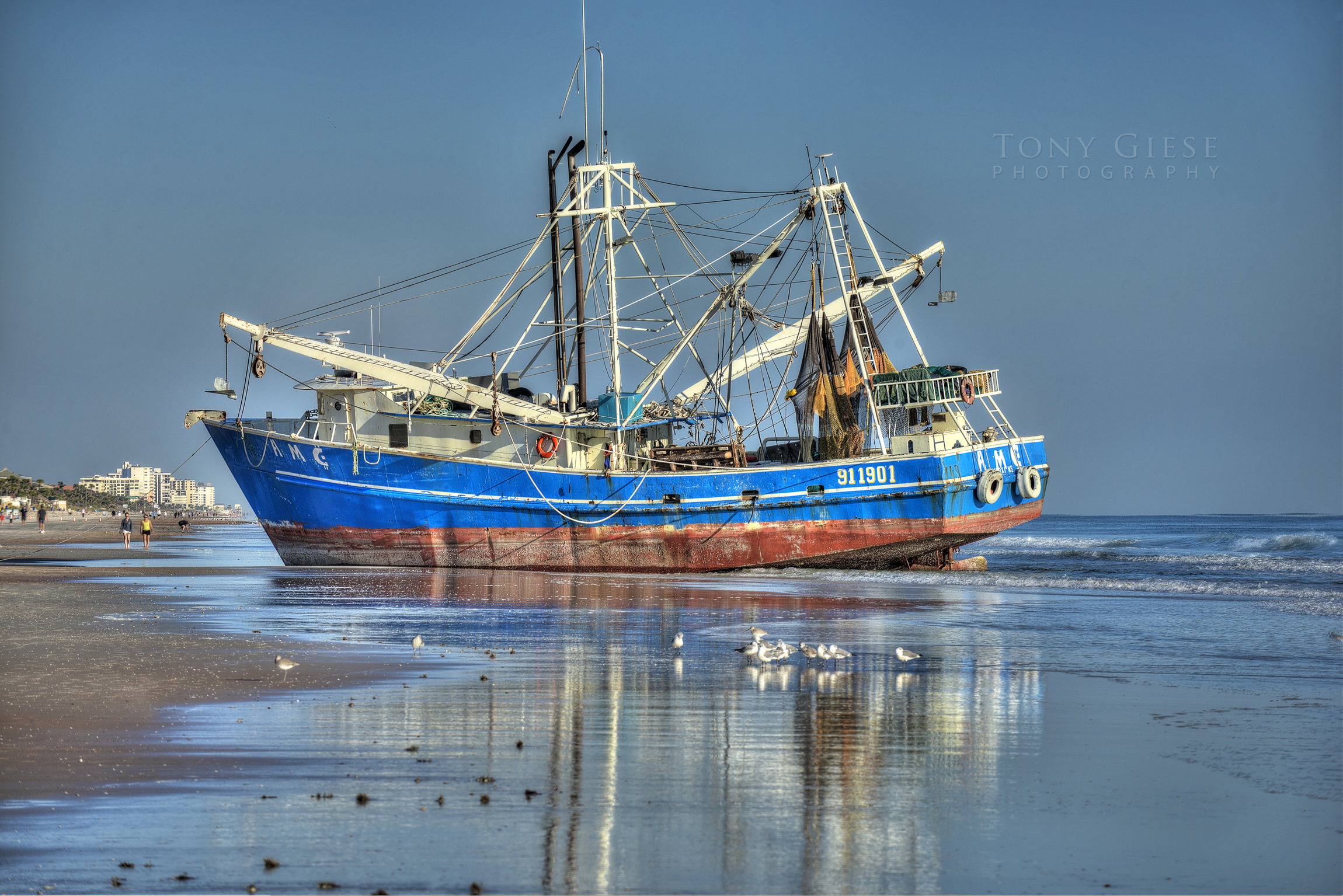 A shrimp boat ran aground in Ormond Beach for almost two weeks before a barge pulled it back out to sea. Interesting beach attraction for tourist and all local residents as it rested on the shoreline.